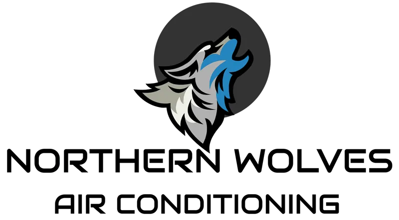 Wolf logo, howling wolf head in gray and blue against a dark gray circle. Brooklyn, NY.